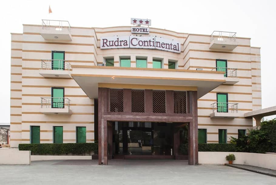 The front facade and entrance of Hotel Rudra Continental