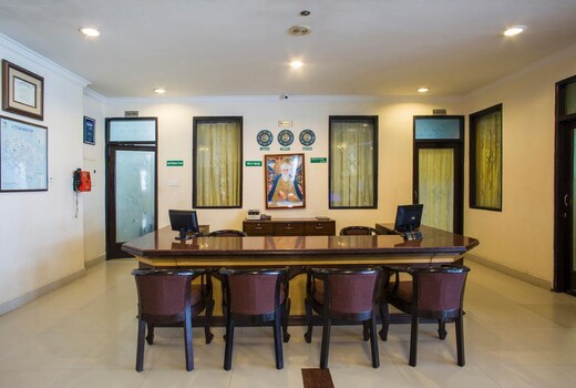 The hotel lobby seen from a wider angle, with seating in view