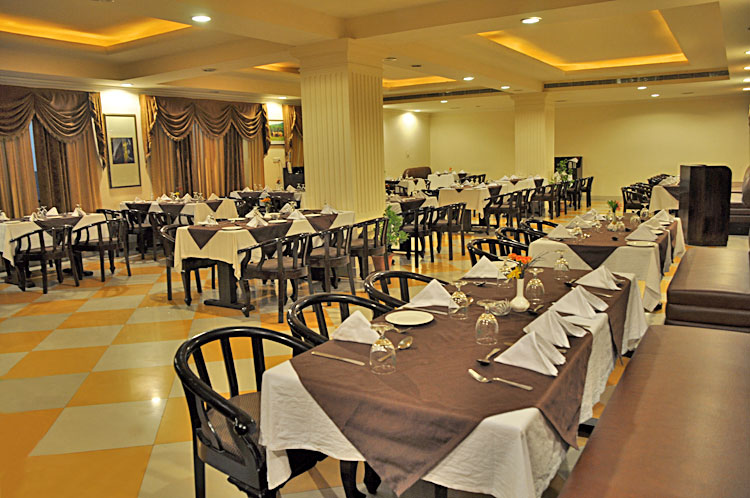 A photograph of the hotel shared by the property, showing its public areas