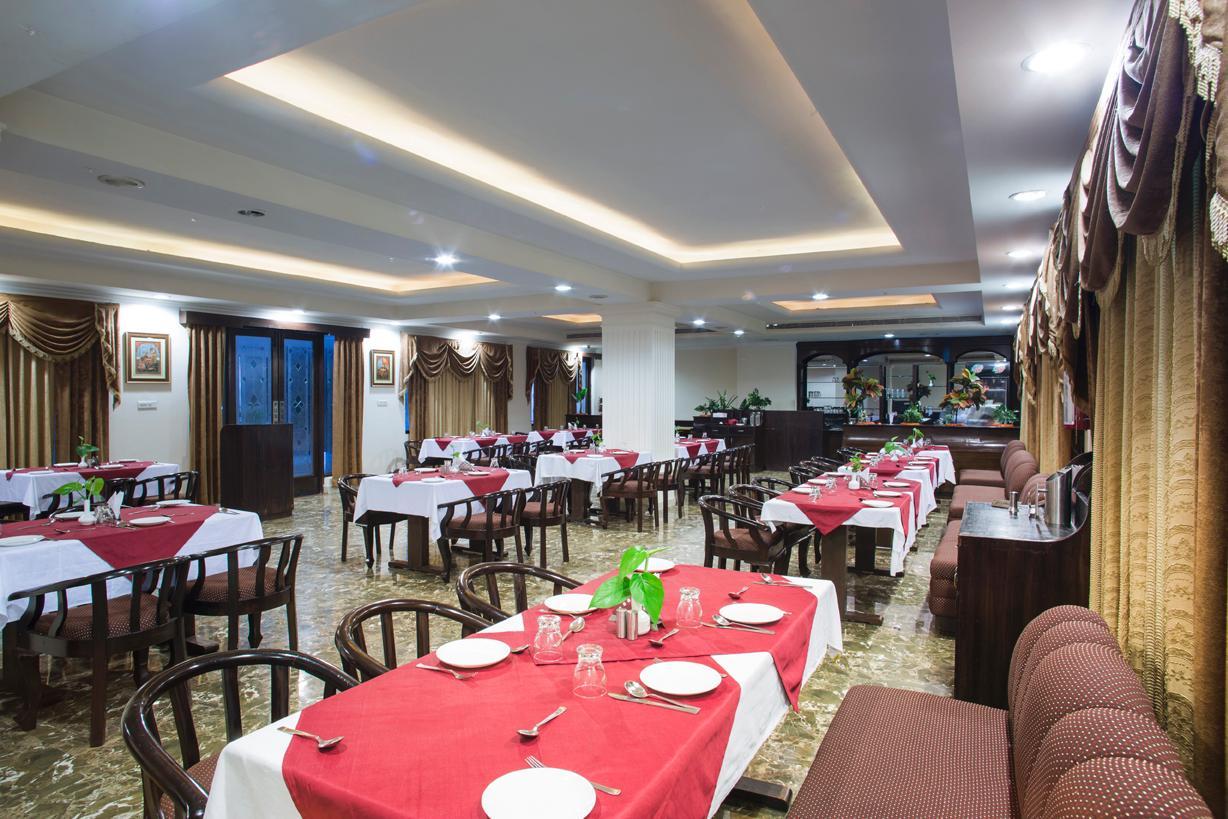 A photograph of the hotel shared by the property, showing its public areas